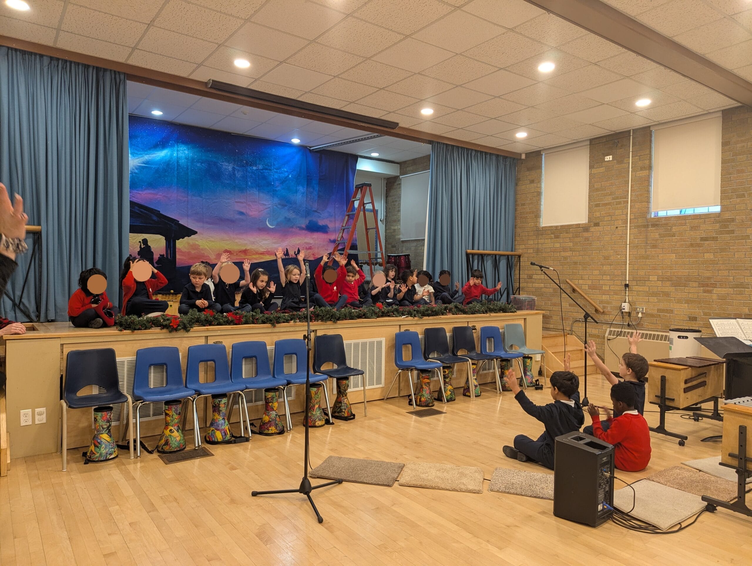 Gr.3-4 helped to lead the younger students with the words and actions of their concert piece.