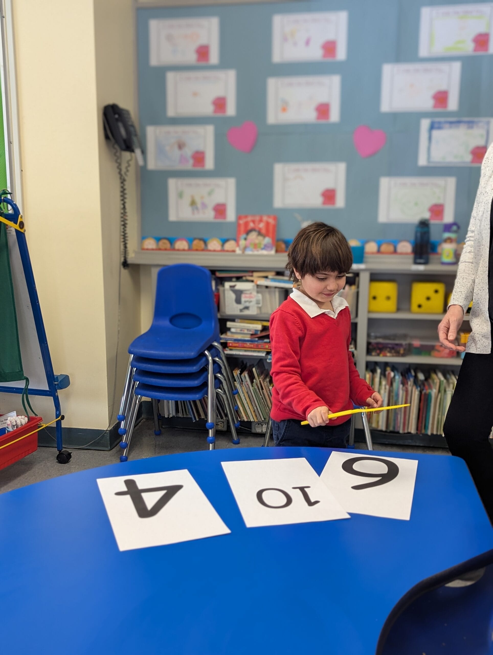 Learning through play, Kindergarten students learning numbers in a fun way.